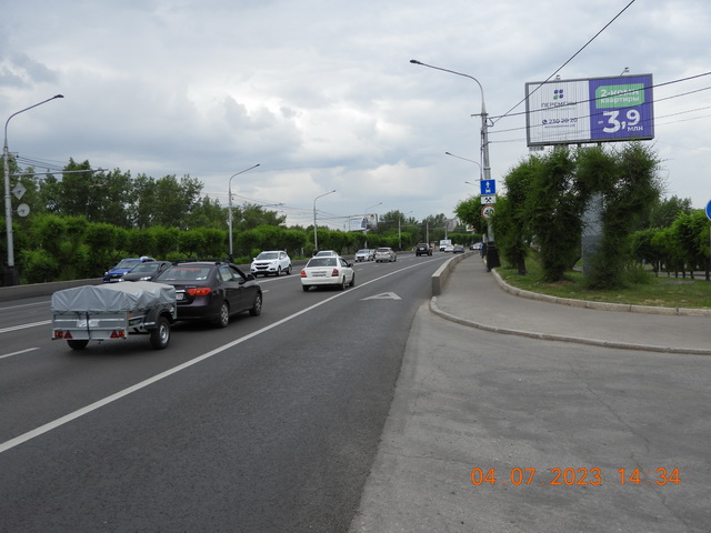 Фотография рекламного носителя, тип: Билборд 3x6, адрес: Коммунальный мост, въезд на Отдыха о., Красноярск, Красноярский край, Россия. Сторона A1-A3 №806354