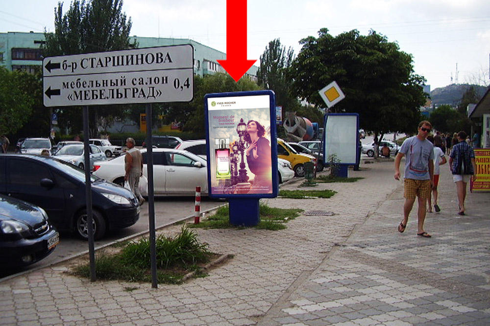 Фотография рекламного носителя, тип: Ситиформат 1.8x1.2, адрес: Крымская ул., продуктовый рынок, напротив аптеки, Феодосия, Республика Крым, Россия. Сторона A №384708