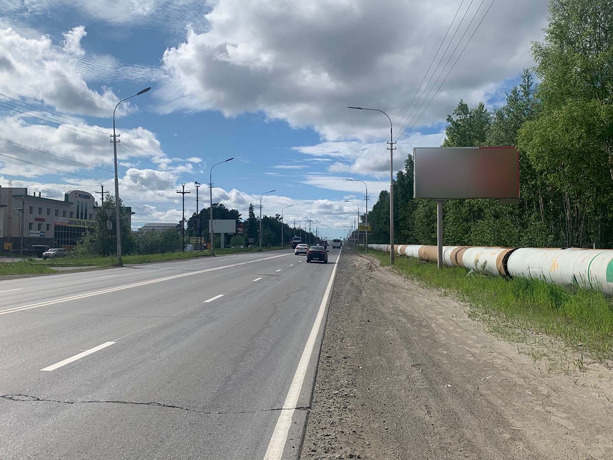 Фотография рекламного носителя, тип: Билборд 3x6, адрес: Нефтеюганское ш., д.62, поз.2, Сургут, Ханты-Мансийский автономный округ – Югра, Россия. Сторона А №440353