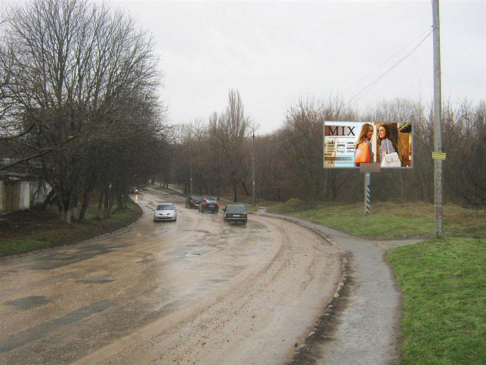 Фотография рекламного носителя, тип: Билборд 3x6, адрес: Объездная ул., на спуске к Радиорынку, Симферополь, Республика Крым, Россия. Сторона A №614101