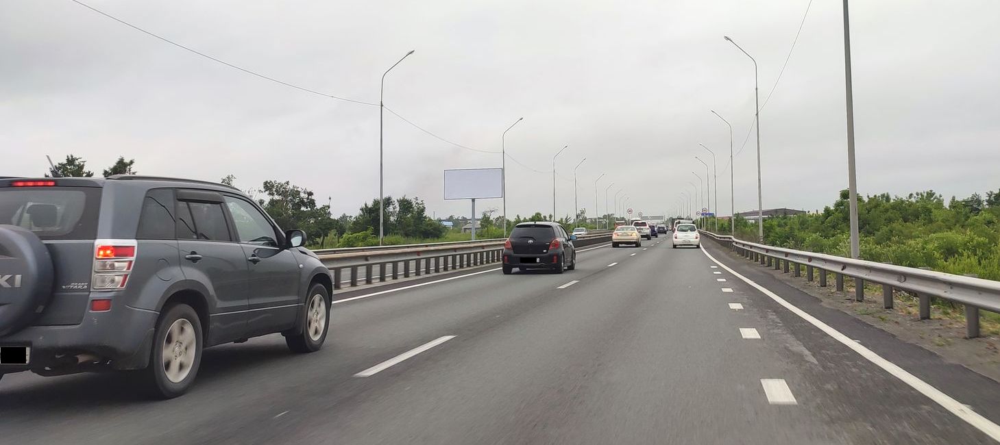 Фотография рекламного носителя, тип: Билборд 3x6, адрес: подъезд к аэропорту г. Вл-ка а/д, 6 370м, Владивосток, Приморский край, Россия. Сторона Б №937827