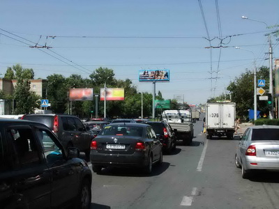 Фотография рекламного носителя, тип: Суперсайт 4x12, адрес: Маршала Жукова пр-т. Х Хорошева ул., Волгоград, Волгоградская область, Россия. Сторона A2 №679259