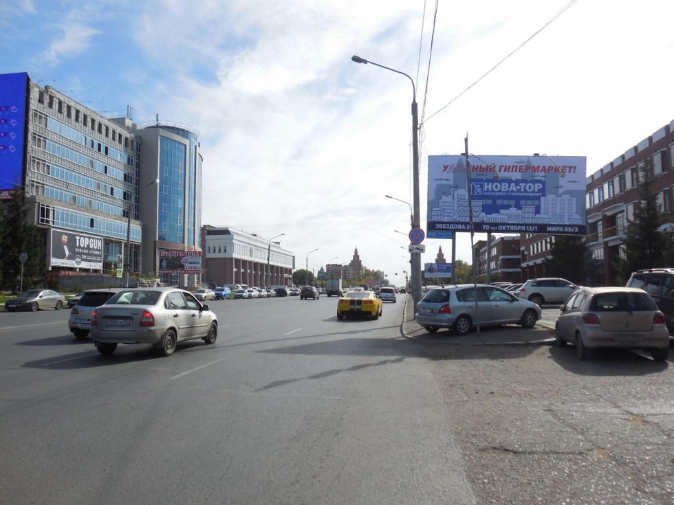 Фотография рекламного носителя, тип: Билборд 3x6, адрес: Жукова ул. X Сажинская ул., д.1, Омск, Омская область, Россия. Сторона А №1010069