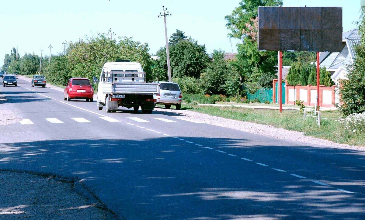Фотография рекламного носителя, тип: Билборд 3x6, адрес: Брюховецкая ст., Олега Кошевого ул. Х Садовая ул., Краснодарский край, Россия. Сторона А №719574