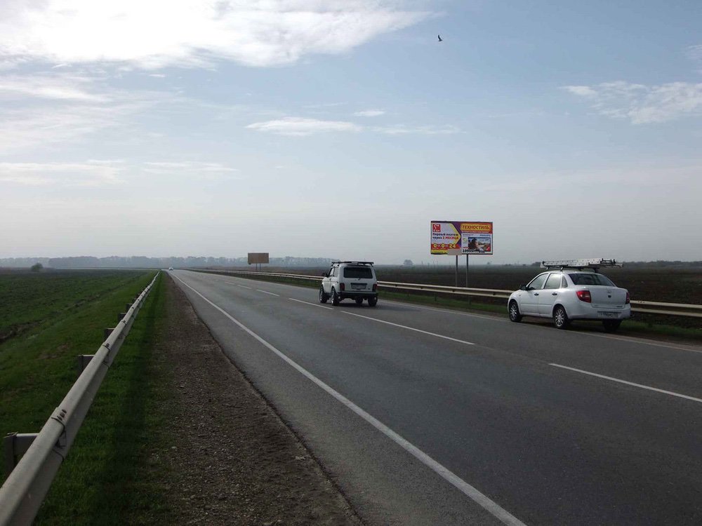 Фотография рекламного носителя, тип: Билборд 3x6, адрес: Темрюк-Краснодар а/д., 66 450м, Славянск-на-Кубани, Краснодарский край, Россия. Сторона А №713865