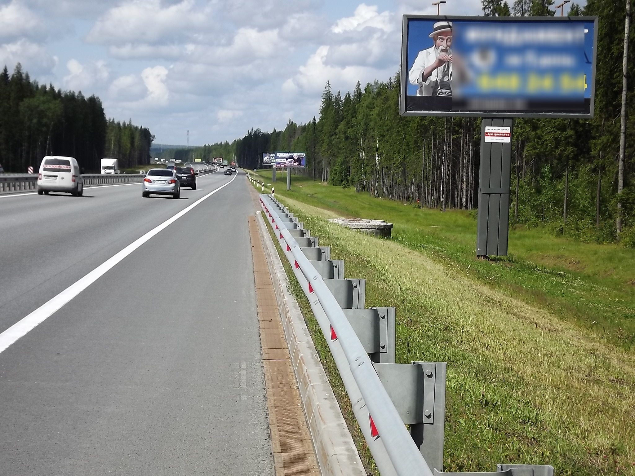 Фотография рекламного носителя, тип: Билборд 3x6, адрес: Новое Приозерское ш., 20 750м, Ленинградская область, Россия. Сторона А №338867