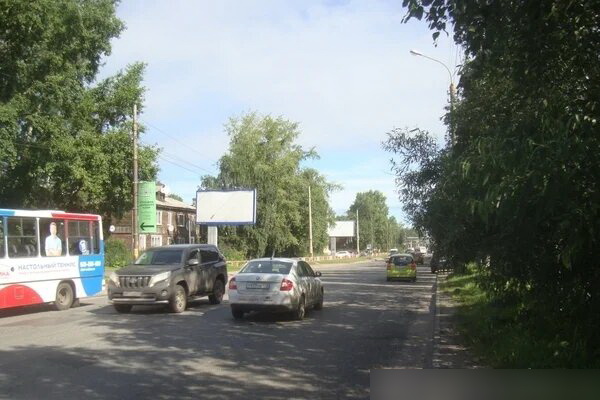 Фотография рекламного носителя, тип: Билборд 3x6, адрес: Обводный канал, д.115, Архангельск, Архангельская область, Россия. Сторона В №765890