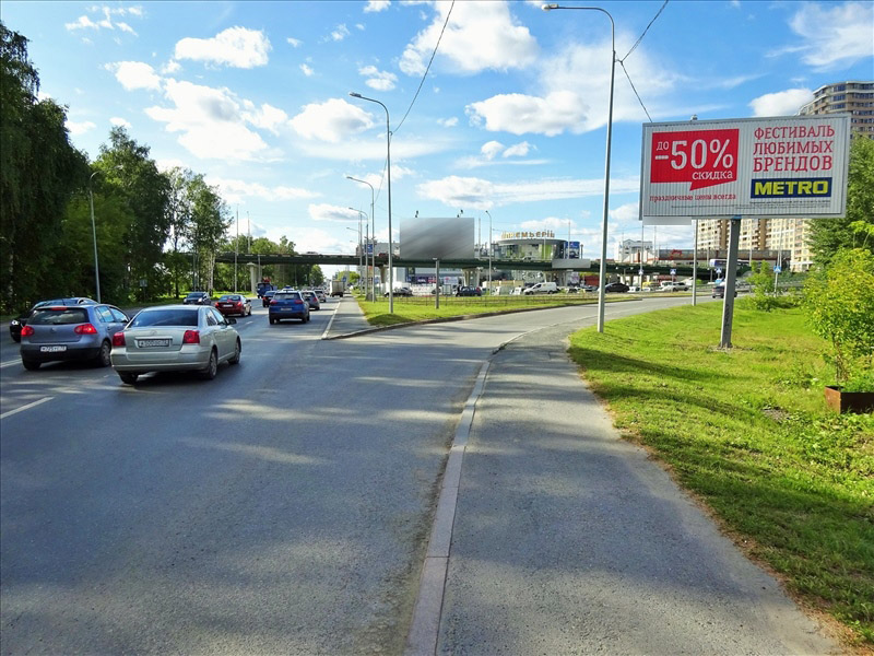 Фотография рекламного носителя, тип: Билборд 3x6, адрес: 50 лет ВЛКСМ ул. Х Мельникайте ул., Тюмень, Тюменская область, Россия. Сторона А1-А3 №559307