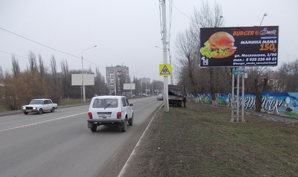 Фотография рекламного носителя, тип: Билборд 3x6, адрес: Баклановский пр-т. Х Магнитный пер., Новочеркасск, Ростовская область, Россия. Сторона А №1073485