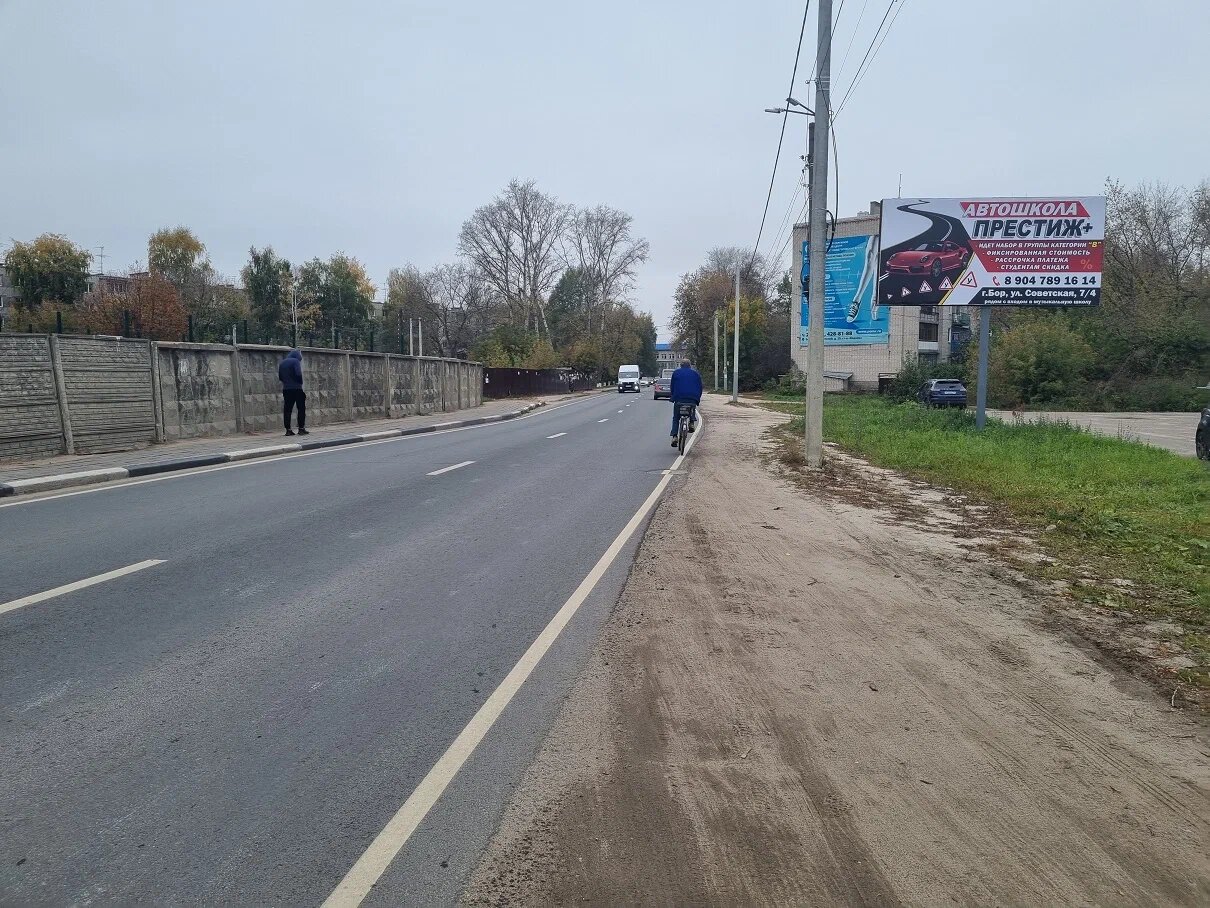 Фотография рекламного носителя, тип: Билборд 3x6, адрес: Крупской ул., д.3, справа, в районе автостоянки, Нижний Новгород, Нижегородская область, Россия. Сторона A №1078015