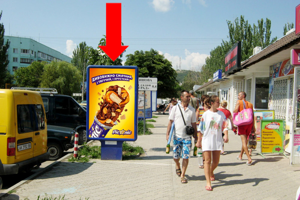 Фотография рекламного носителя, тип: Ситиформат 1.8x1.2, адрес: Крымская ул., продуктовый рынок, напротив магазина №273, Феодосия, Республика Крым, Россия. Сторона A №384710