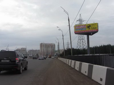 Фотография рекламного носителя, тип: Суперсайт 4x12, адрес: Аграрная ул., развязка на пересечении с Победы пр-т., Казань, Республика Татарстан, Россия. Сторона А №761429