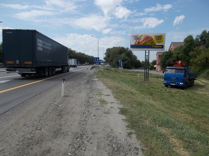 Фотография рекламного носителя, тип: Билборд 3x6, адрес: М-4 Дон а/д., 1 039 800м, Аксай, Ростовская область, Россия. Сторона A №870689