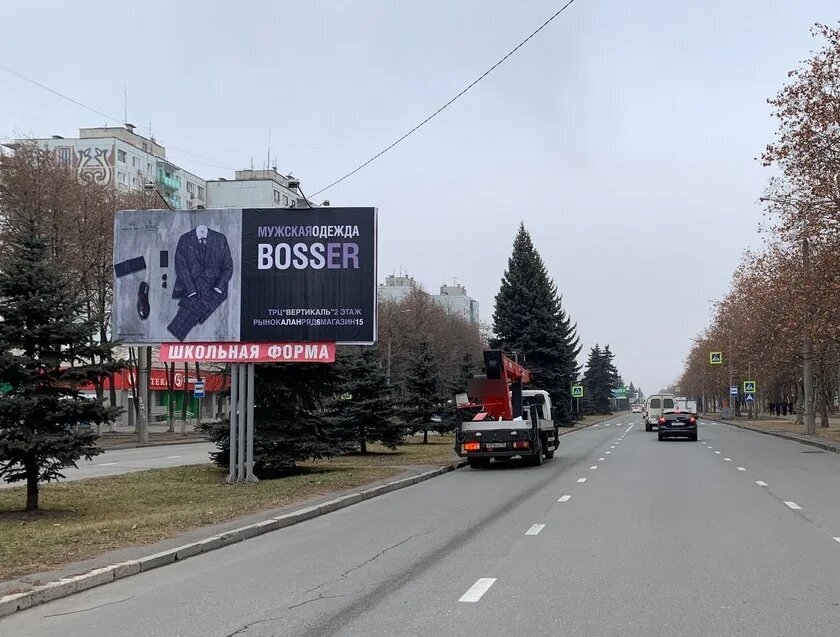 Фотография рекламного носителя, тип: Билборд 3x6, адрес: Владикавказская ул., н-в д.12, Владикавказ, Республика Северная Осетия – Алания, Россия. Сторона Б1 №451645