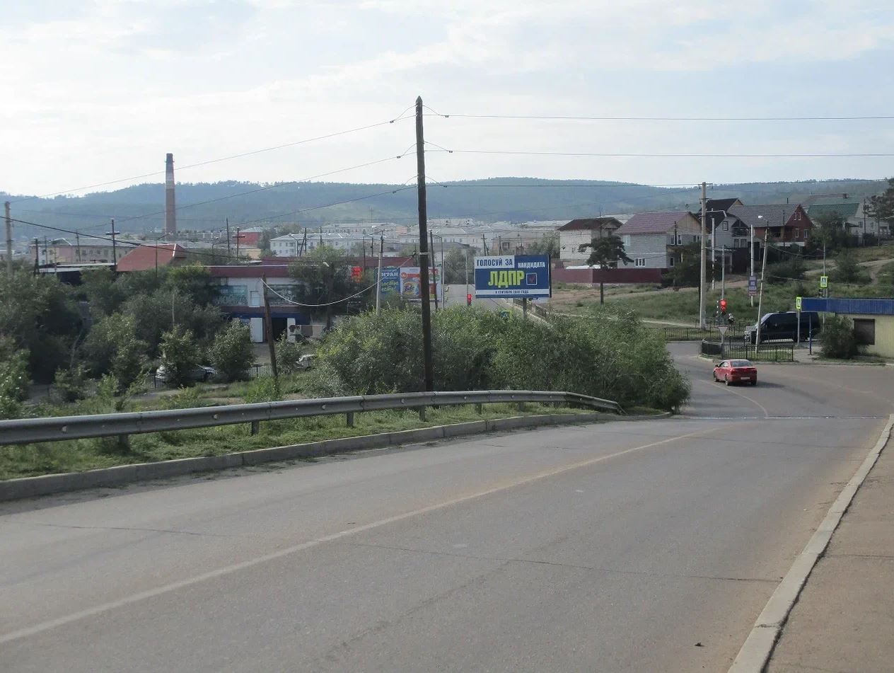 Фотография рекламного носителя, тип: Билборд 3x6, адрес: Хоринская ул., д.2б, Улан-Удэ, Республика Бурятия, Россия. Сторона C №958222