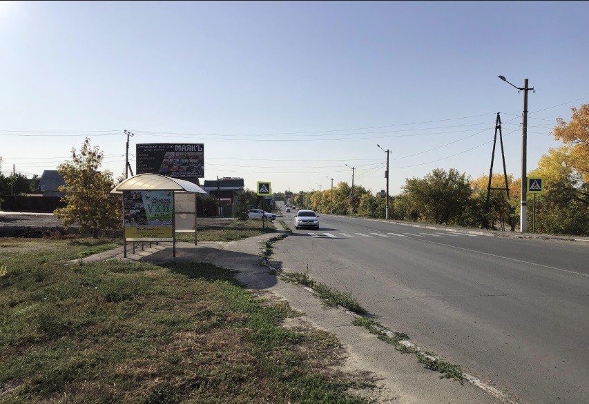 Фотография рекламного носителя, тип: Остановка 1.4x1.6, адрес: Петровская ул., д.27, ост. 2-й поворот, Вольск, Саратовская область, Россия. Сторона Б №1078454