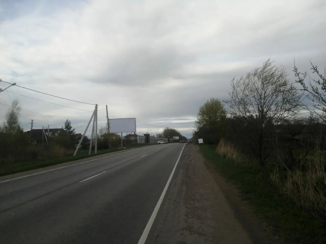 Фотография рекламного носителя, тип: Билборд 3x6, адрес: Стрельнинское ш., д.123А, Ленинградская область, Россия. Сторона Б №992091