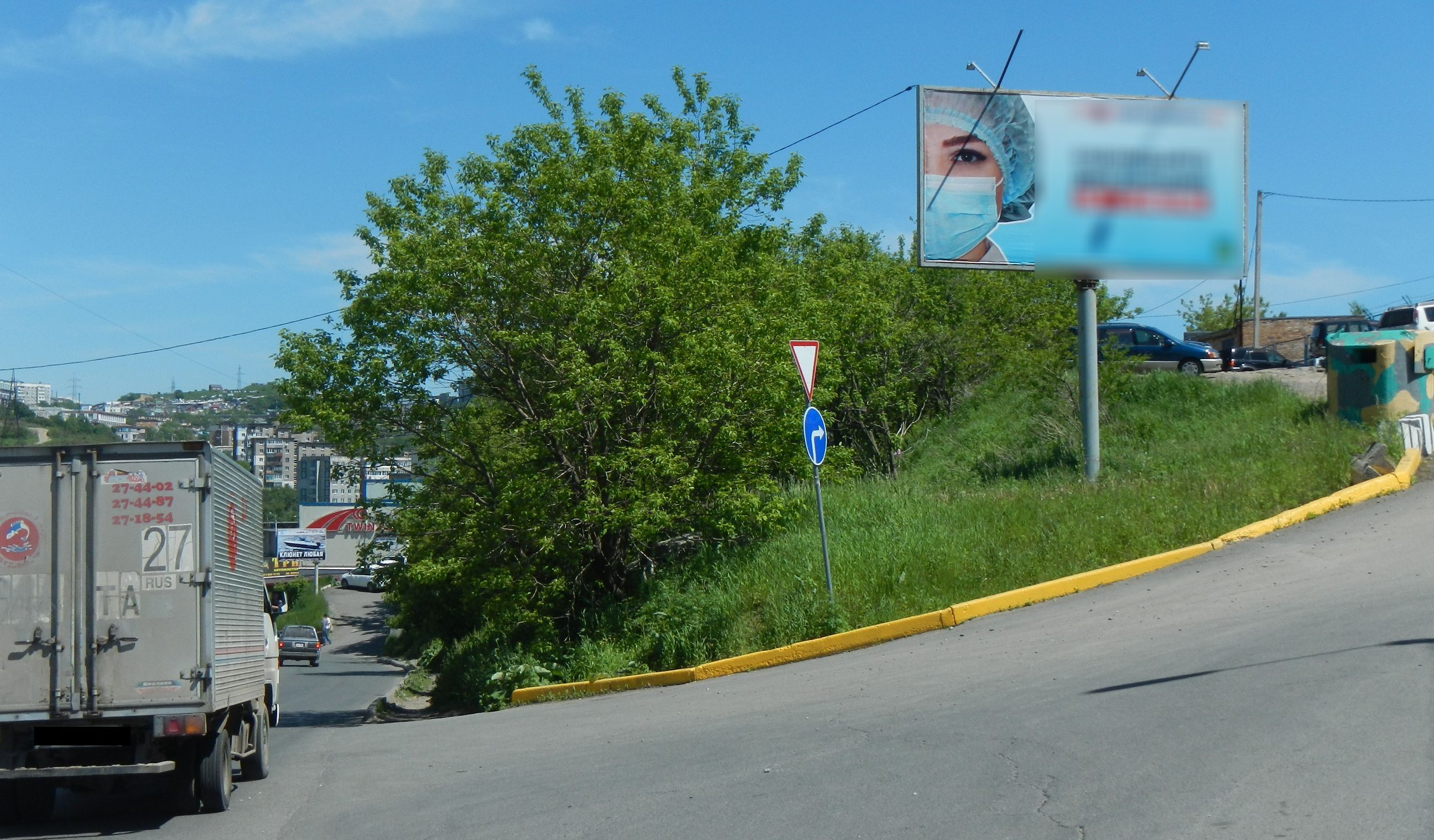 Фотография рекламного носителя, тип: Билборд 3x6, адрес: Котельникова ул., д.21, Владивосток, Приморский край, Россия. Сторона А №747984