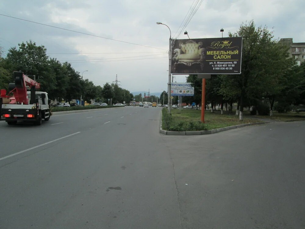 Фотография рекламного носителя, тип: Билборд 3x6, адрес: Доватора пр-т., д.9, Владикавказ, Республика Северная Осетия – Алания, Россия. Сторона А №451682
