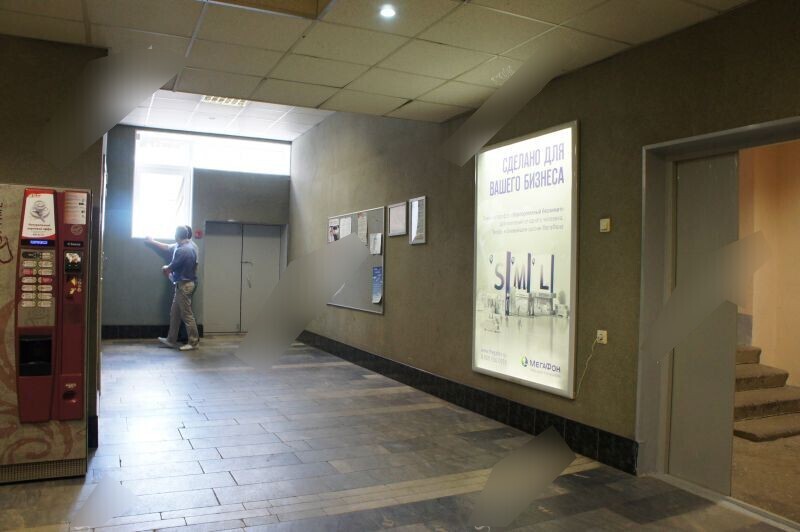 Фотография рекламного носителя, тип: Лайтбокс, адрес: Бизнес-центр «Охта», Ворошилова ул., д.2, Санкт-Петербург, Россия. Сторона/вариант №657345