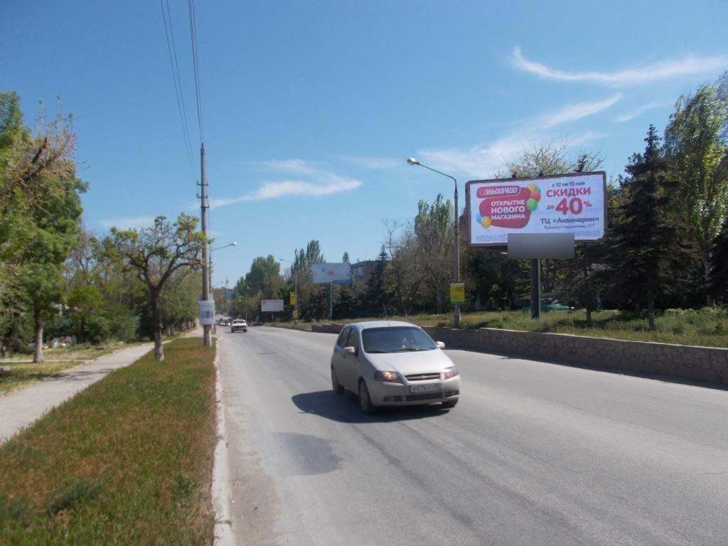 Фотография рекламного носителя, тип: Билборд 3x6, адрес: Симферопольское ш., д.33, Феодосия, Республика Крым, Россия. Сторона A №537672