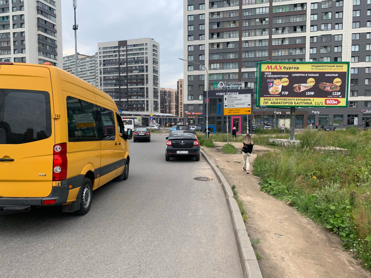 Фотография рекламного носителя, тип: Билборд 3x6, адрес: Мурино г., Менделеева б-р., 145м от ст.м. Девяткино, Ленинградская область, Россия. Сторона А №792208