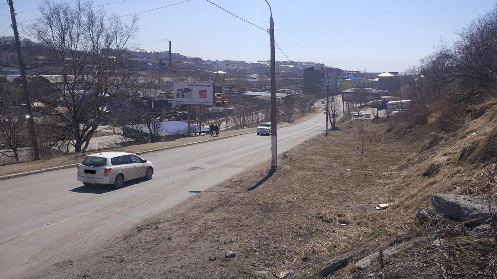 Фотография рекламного носителя, тип: Билборд 3x6, адрес: Корсаков г., Корсаковская ул., Южно-Сахалинск, Сахалинская область, Россия. Сторона Б №1010761