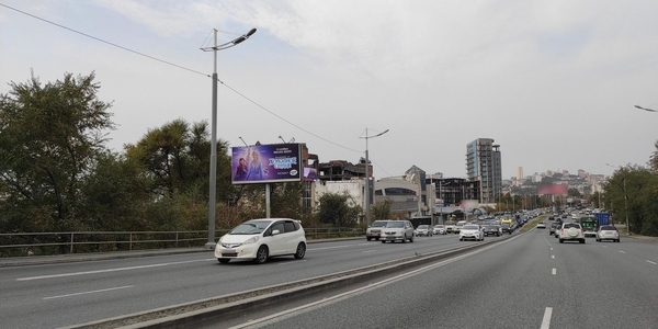 Фотография рекламного носителя, тип: Билборд 3x6, адрес: 100-лет Владивостоку ул., д.57д, Владивосток, Приморский край, Россия. Сторона Б №767156