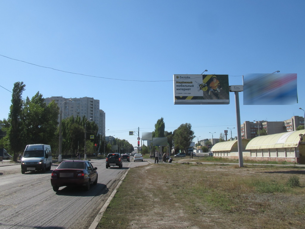 Фотография рекламного носителя, тип: Билборд 3x6, адрес: Землячки ул., ост."8-ой Воздушной Армии ул.", Волгоград, Волгоградская область, Россия. Сторона А1 (А) №1042309