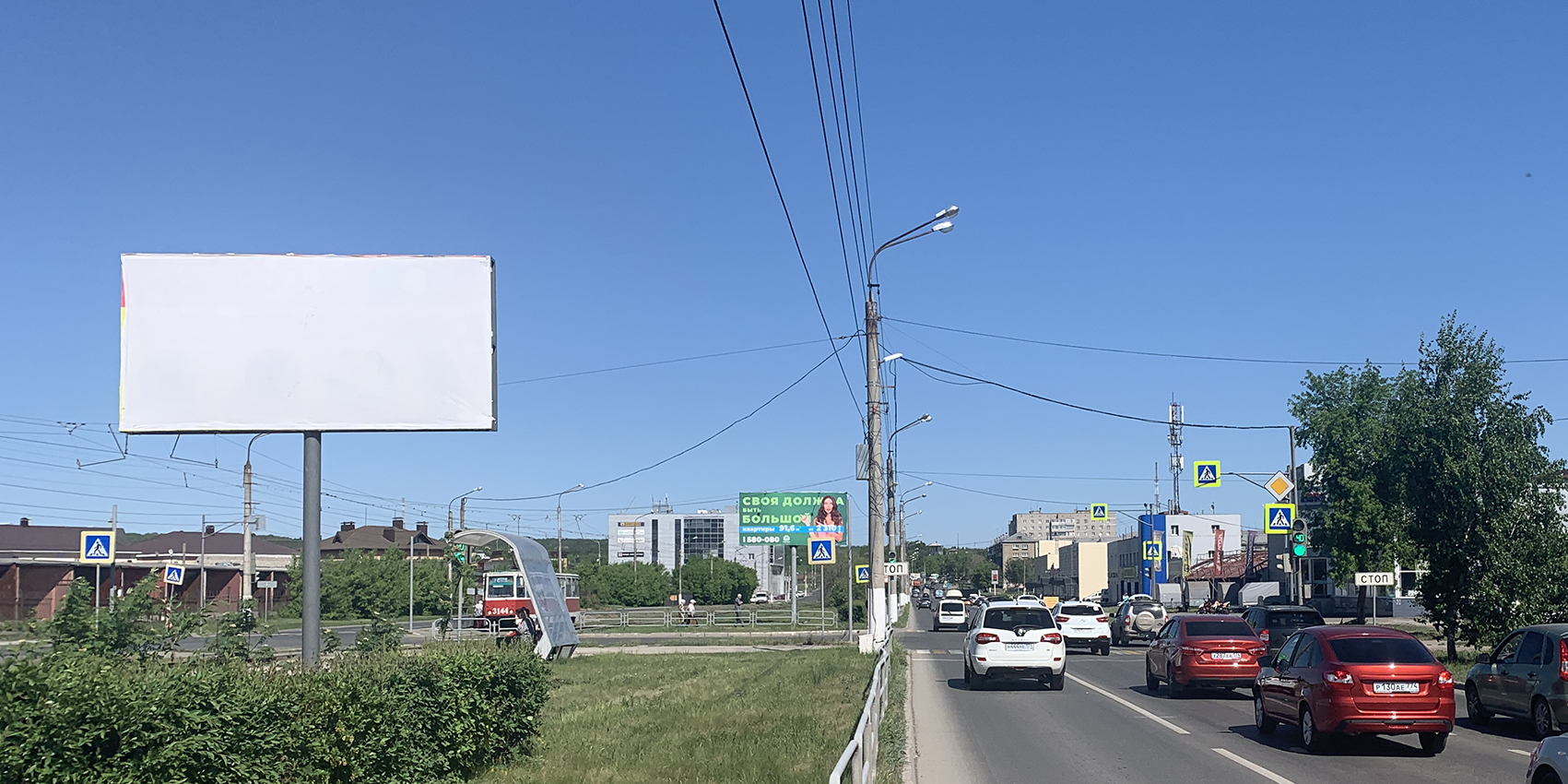 Фотография рекламного носителя, тип: Билборд 3x6, адрес: Галиуллина ул., д.3а Х Сталеваров ул., Магнитогорск, Челябинская область, Россия. Сторона A1 №1052234