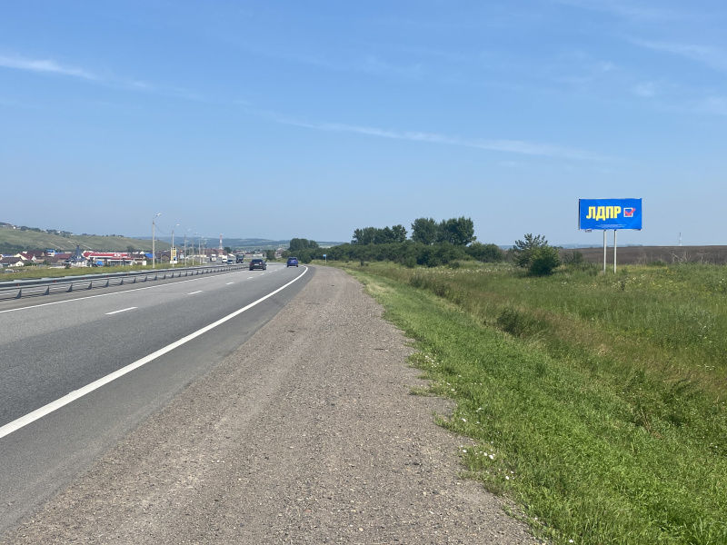 Фотография рекламного носителя, тип: Билборд 3x6, адрес: М53 а/д, 7 000м до поста ДПС, Красноярск, Красноярский край, Россия. Сторона А №780183