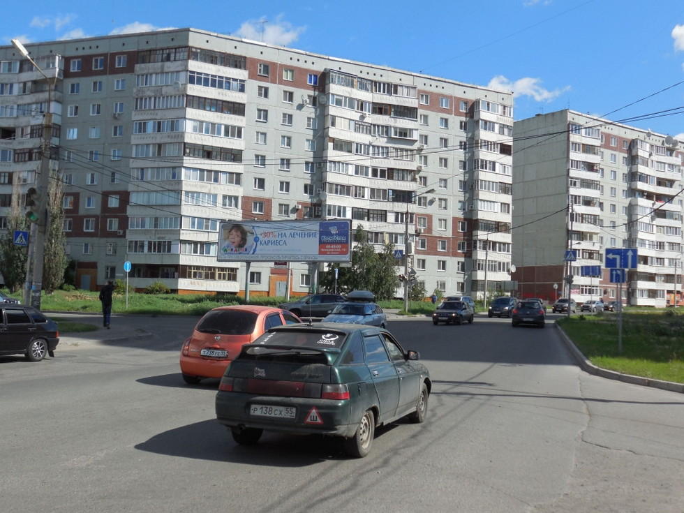 Фотография рекламного носителя, тип: Суперсайт 3x12, адрес: Волховстроя ул., д.18, Омск, Омская область, Россия. Сторона ВВ1 №1010044