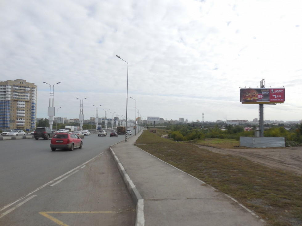 Фотография рекламного носителя, тип: Суперсайт 4x12, адрес: им. 60-летия Победы мост X Енисейская 1-я ул.,д.44, Омск, Омская область, Россия. Сторона А №1009817