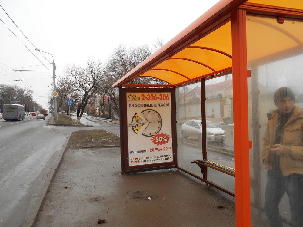 Фотография рекламного носителя, тип: Остановка 1.8x1.2, адрес: Шолохова пр-т., ост. ПервомР "Кизитериновская", поз.1, Ростов-на-Дону, Ростовская область, Россия. Сторона А №631339