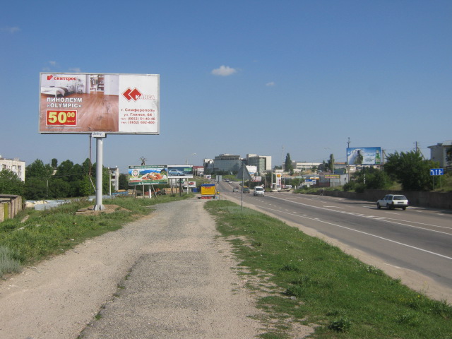 Фотография рекламного носителя, тип: Билборд 3x6, адрес: Ялтинская Объездная ул., перед Авторынком, Симферополь, Республика Крым, Россия. Сторона B №412184