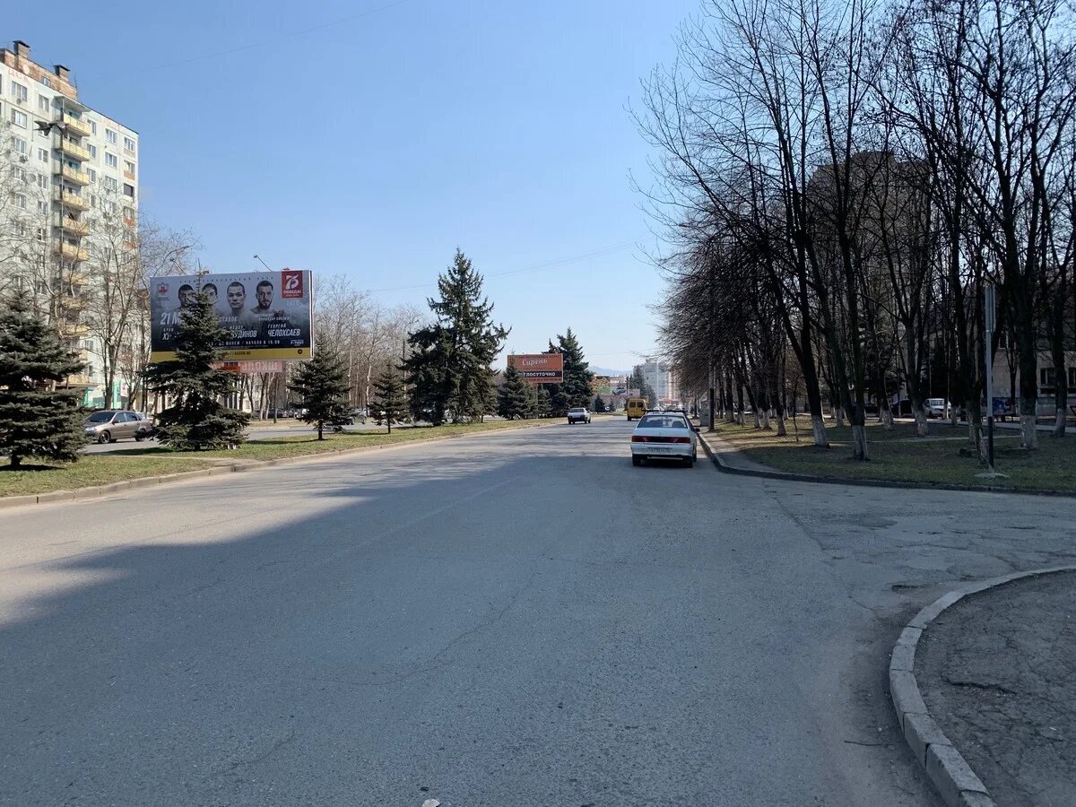 Фотография рекламного носителя, тип: Билборд 3x6, адрес: Владикавказская ул., н-в д.12, Владикавказ, Республика Северная Осетия – Алания, Россия. Сторона Б2 №451646