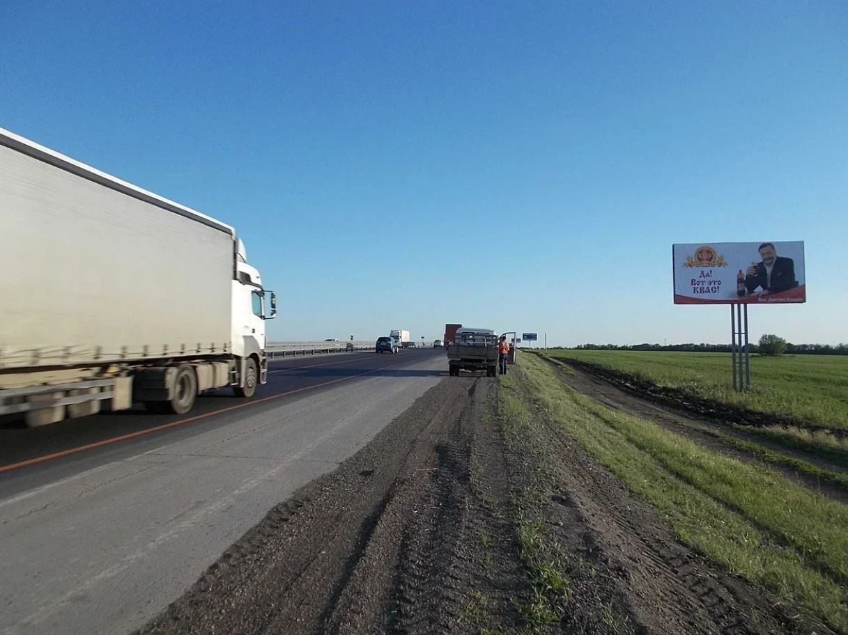 Фотография рекламного носителя, тип: Билборд 3x6, адрес: Трасса М4 а/д., 998 900м, Ростов-на-Дону, Ростовская область, Россия. Сторона A №552524