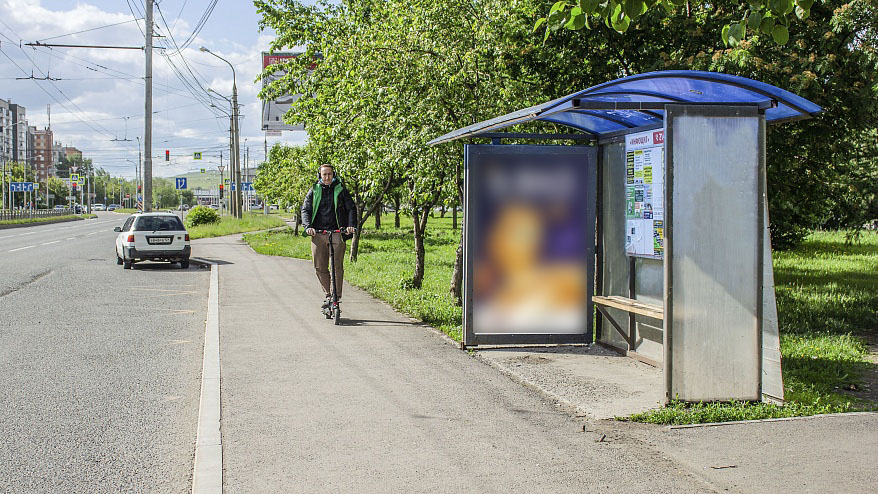 Фотография рекламного носителя, тип: Остановка 1.8x1.2, адрес: Комсомольский пр-т., остановка «9 мая», Красноярск, Красноярский край, Россия. Сторона А №952556