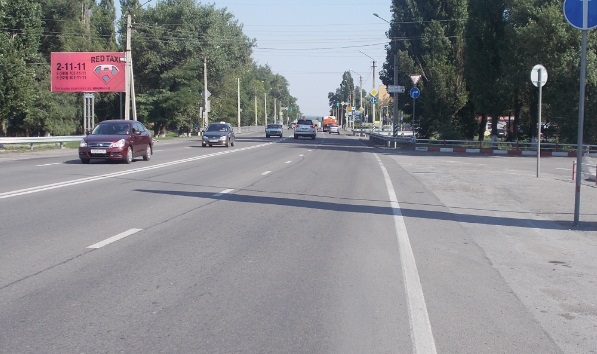 Фотография рекламного носителя, тип: Билборд 3x6, адрес: Харьковская ул., д.4а, на км 893 530м, Новошахтинск, Ростовская область, Россия. Сторона Б №1093617