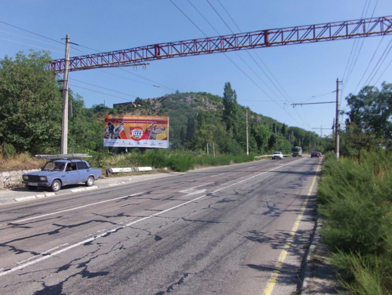 Фотография рекламного носителя, тип: Билборд 3x6, адрес: Симферополь-Ялта а/д, 713 250м., Утес пос., Гурзуф, Республика Крым, Россия. Сторона Б №748558