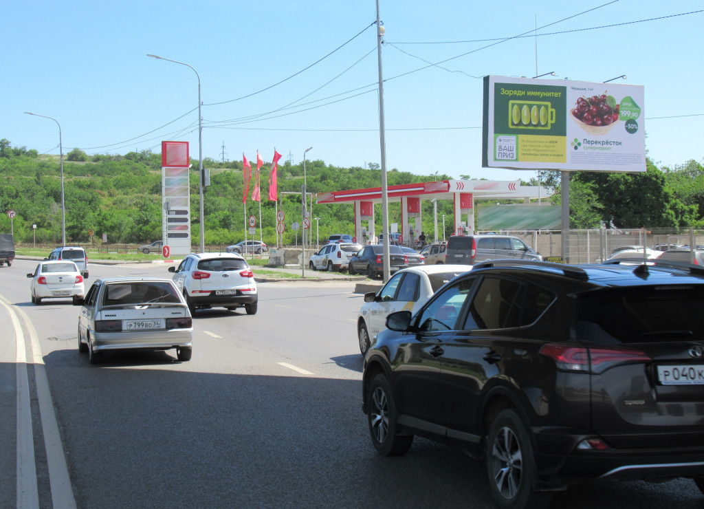 Фотография рекламного носителя, тип: Билборд 3x6, адрес: Рокоссовского ул., д.76, Волгоград, Волгоградская область, Россия. Сторона А №596169