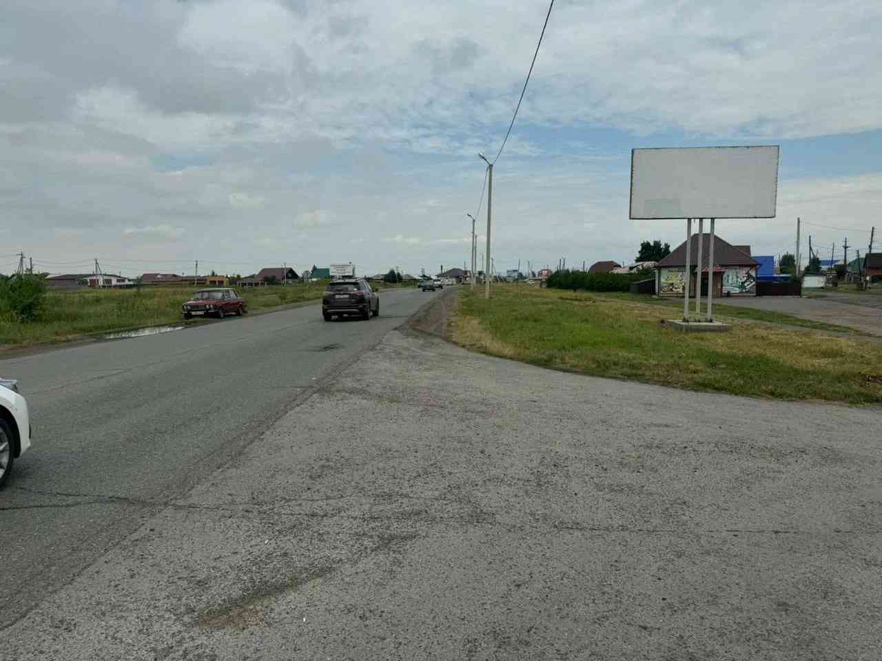 Фотография рекламного носителя, тип: Билборд 3x6, адрес: Калинино с., Студенческая ул., в районе д.10 по Трактовая ул., Абакан, Республика Хакасия, Россия. Сторона А №777948
