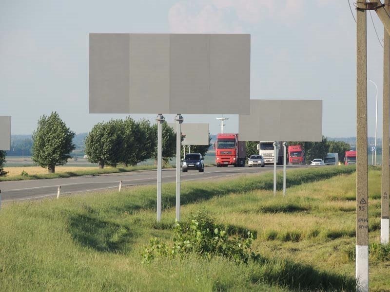 Фотография рекламного носителя, тип: Билборд 3x6, адрес: Крымск-Славянск-на-Кубани а/д., 6 070м, Крымск, Краснодарский край, Россия. Сторона А №713939