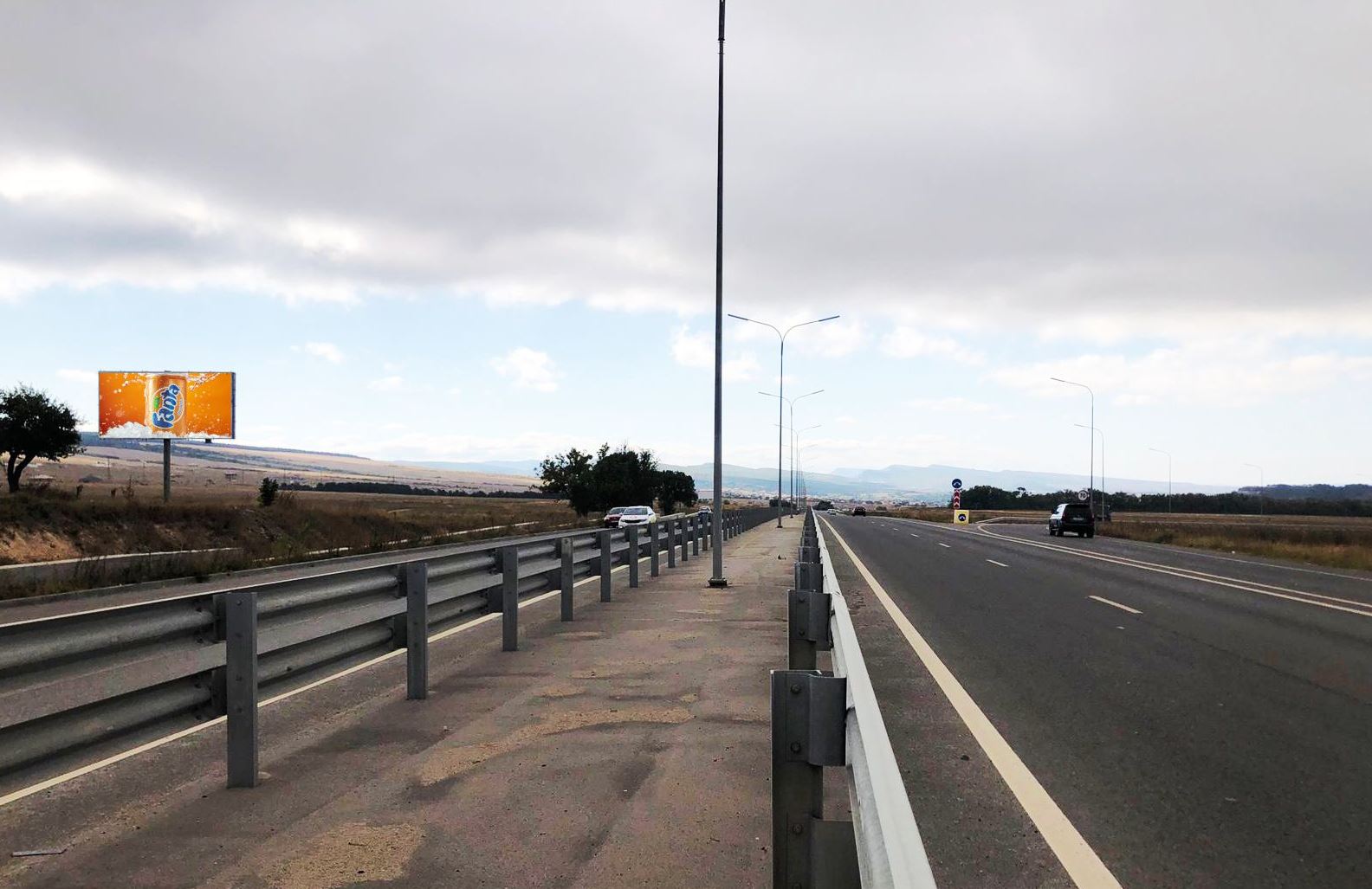 Фотография рекламного носителя, тип: Билборд 3x6, адрес: Севастопольское ш., 9 320м, Симферополь, Республика Крым, Россия. Сторона B №947369