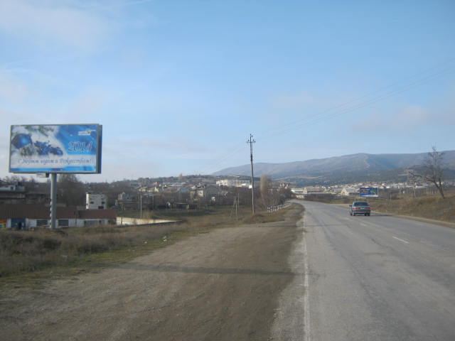 Фотография рекламного носителя, тип: Билборд 3x6, адрес: Старый Крым г., Ливанского ул., въезд в город, Феодосия, Республика Крым, Россия. Сторона B №412675