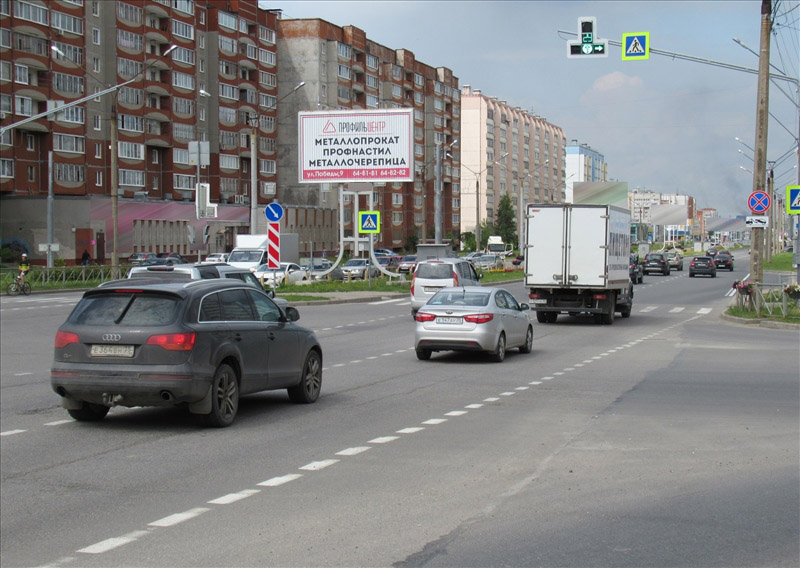 Фотография рекламного носителя, тип: Билборд 3x6, адрес: Октябрьский пр-т., д.69, Череповец, Вологодская область, Россия. Сторона А1-A3 №638593