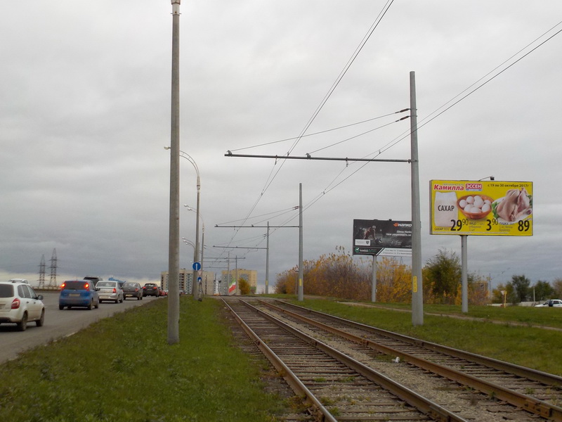 Фотография рекламного носителя, тип: Билборд 3x6, адрес: Набережночелнинский пр-т., мост "Челныгорстроя", поз.3, Набережные Челны, Республика Татарстан, Россия. Сторона A №414502