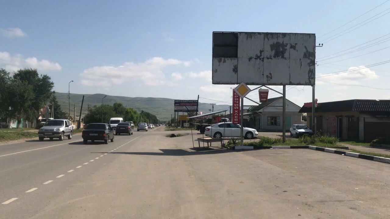 Фотография рекламного носителя, тип: Билборд 3x6, адрес: Ленина ул., д.39, Учкекен, Республика Карачаево-Черкесия, Россия. Сторона А №948165
