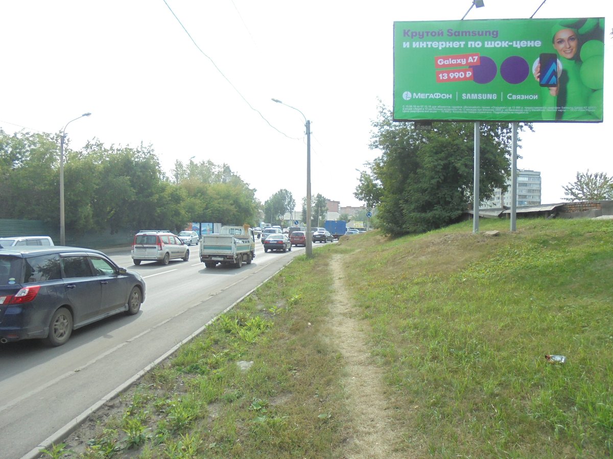 Фотография рекламного носителя, тип: Билборд 3x6, адрес: Брянская ул. Х Северо-Енисейская ул., д.44г, Красноярск, Красноярский край, Россия. Сторона А №779954