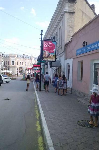 Фотография рекламного носителя, тип: Ситиформат 1.8x1.2, адрес: Галерейная ул. Х Русская ул., Феодосия, Республика Крым, Россия. Сторона A №537650